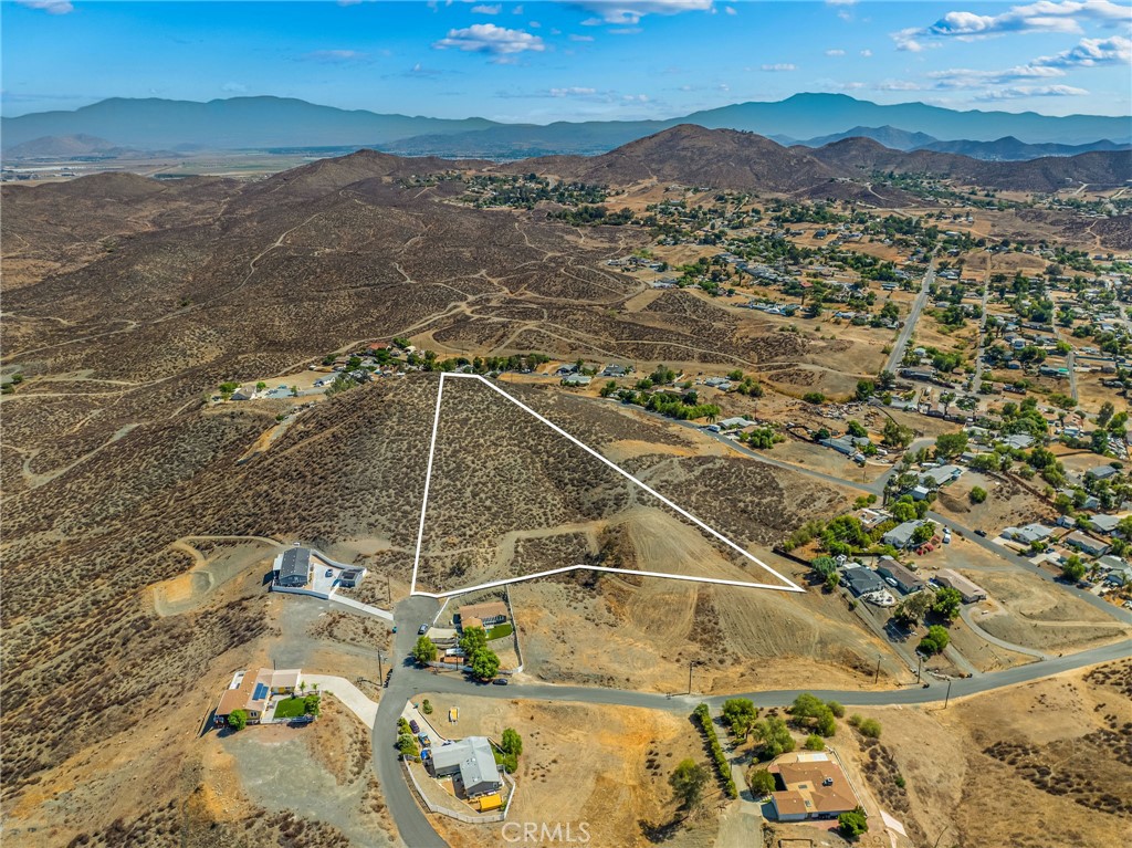 This 2.3-acre hillside lot in Quail Valley, Menifee is a rare opportunity in the buildable zone, offering endless potential to create your dream home, retreat, or investment project. Perched on an elevated hillside, the property boasts sweeping views of the valley and surrounding mountains while providing privacy and room for creativity. With over two acres of space, you’ll have plenty of options to design, expand, and enjoy the natural landscape—all while being just minutes from shopping, dining, schools, and freeway access. Whether you’re ready to build now or hold for the future, this lot combines seclusion, convenience, and limitless possibilities.