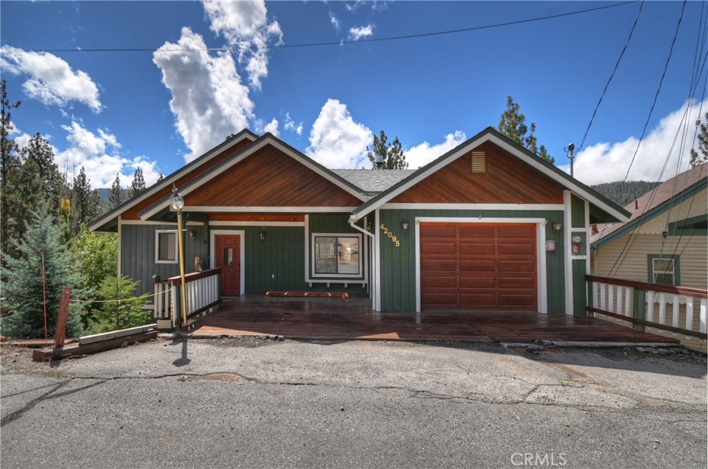 Welcome to 42895 Monterey Street in Big Bear Lake. This 3-bedroom, 2-bathroom home is set in a prime location just a couple miles from Bear Mountain Resort, and the Moonridge Corridor—home to the Big Bear Alpine Zoo. Designed for mountain living, the property offers ski slope views, vaulted wood ceilings, and a spacious layout that blends comfort with character. Recent upgrades include a rare central air conditioning unit and paid-off solar panels, providing the benefit of little to no electric bills. Relax after a day on the slopes in the private spa or take in the views from the deck. The thoughtful floor plan provides an inviting main living area, a functional kitchen and dining space, and three well-sized bedrooms, making it ideal for full-time living, a second home, or a vacation rental opportunity. With its close proximity to ski resorts, the village, and popular Moonridge attractions, this Big Bear Lake property offers the perfect combination of convenience and mountain lifestyle.