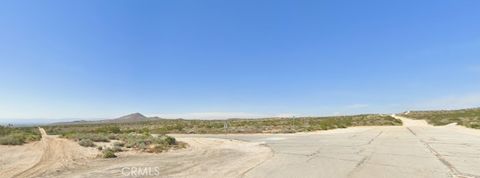 Photo of 100 W Dawn Road, Rosamond, CA 93560 (MLS # HD26039118)
