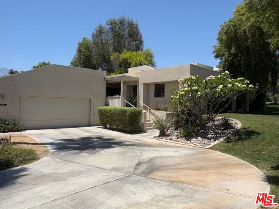 The only Mission Hills Country Club condo ( ON the Diana Shore's Tournament Course fairway - Hole #16 of the annual Galleri Championship's Tour ), to have a hard-covered patio, complete with two fans, canned lighting and a built-in BBQ counter. This condo also features an expanded addition of an open floor-plan office, dining room and the luxury of an attached private golf cart garage access, which no other condo has, in this particular development of this golf course area! This property's lay-out has immense value-add potential and benefits for any new owner to apply their own upgrades and aesthetics to suit their customized needs, maximize their quality of life, and dramatically increase property value at the same time. ( Suggestions; expand kitchen into the original dining room which is currently being used as a large walk-in pantry, and or, add a single wall and door to the office area and create a 3rd bedroom. Sky is the limit with creativity ! ) Also, this property has a rare, extra large private driveway that can easily fit 6 cars and an attached 2 car garage with expansive built-in cabinets throughout. Despite all these unique values, it is aggressively priced to sell, in fact it's the LOWEST PRICE property, that's actually ON the golf course, and not even set back, so do not miss out on this opportunity ! Community amenities include: community pools and spas, pickleball/tennis, Spa and Fitness Center, Clubhouse and restaurant. Indian assessment taxes will be paid/cleared by the seller. Property sold 'As is".
