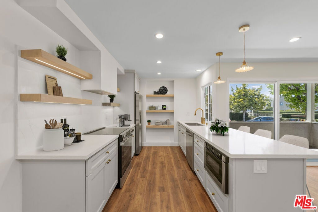 Photo of 8712 Chessington Drive #261F, Inglewood, CA 90305 (MLS # 26864293)