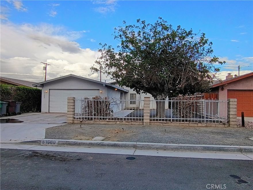 Available Oct 1 or sooner. Spacious 1290 SF 2 bd, 2 bath, single family residence located in La Quinta Cove. Pics are from previous rental. Updated pics coming. Walking distance to historic Old Town La Quinta. Both bedrooms are very spacious, with a large walk-in closet in the master. Very ample closet storage space inside the house. Brick gas/wood fireplace in the living room and a skylight that provides ample natural light. Painted in neutral tones. Full 2 car garage with hookup for washer and dryer. Large covered patio in back with 2 overhead fans and a huge shade tree in the front with beautiful mountain views. An excellent value in a quiet, well-situated location. You will not be disappointed! Tenants to maintain yard maintenance.