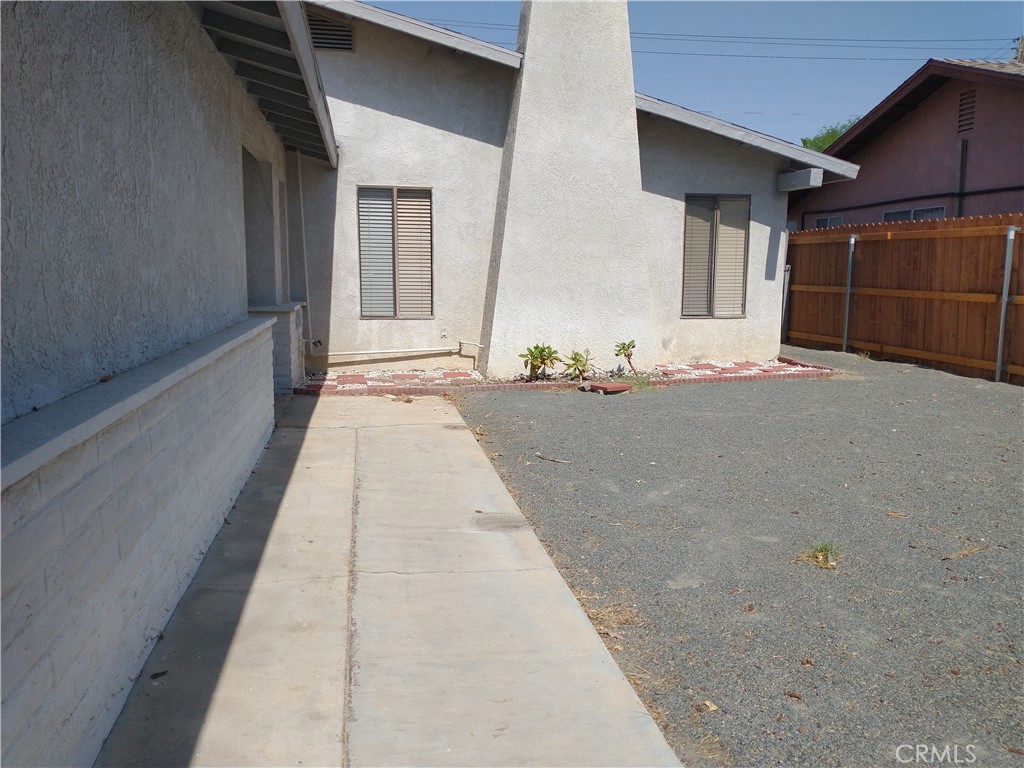 Available Oct 1 or sooner. Spacious 1290 SF 2 bd, 2 bath, single family residence located in La Quinta Cove. Pics are from previous rental. Updated pics coming. Walking distance to historic Old Town La Quinta. Both bedrooms are very spacious, with a large walk-in closet in the master. Very ample closet storage space inside the house. Brick gas/wood fireplace in the living room and a skylight that provides ample natural light. Painted in neutral tones. Full 2 car garage with hookup for washer and dryer. Large covered patio in back with 2 overhead fans and a huge shade tree in the front with beautiful mountain views. An excellent value in a quiet, well-situated location. You will not be disappointed! Tenants to maintain yard maintenance.