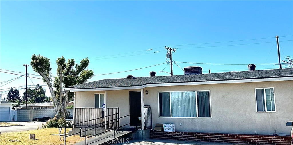 Spacious and versatile single-story home located in the heart of beautiful Garden Grove. This 8-bedroom, 5-bathroom residence features a thoughtfully designed step-down floor plan offering ample living space and flexibility. All additions were completed with permits, ensuring peace of mind and compliance. The expansive driveway provides parking for several vehicles. Don't miss this rare opportunity with excellent potential for a variety of uses-ideal for investors or those seeking a high-capacity home.