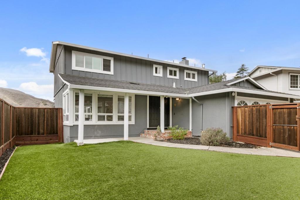 Nestled on a peaceful cul-de-sac, this beautifully updated 4-bedroom, 3-bath home offers over 2,300 sq ft of bright, open living on a generous 8,000+ sq ft lot with stunning hillside views. The spacious, modern floor plan features a newly renovated kitchen with stainless steel appliances, an oversized island, gas cooktop, large sink, hardwood floors, and elegant recessed lightingperfect for cooking and entertaining. The open dining and living areas flow seamlessly and include a cozy fireplace for added warmth. Bedrooms are thoughtfully placed on both levels, including a private lower-level bedroom and full bath ideal for guests, a home office, or flexible living space. Outside, enjoy a beautifully designed wraparound deck that invites you to take in the panoramic views, plus a fully fenced, low-maintenance yard offering privacy and plenty of room for relaxing, gardening, or play. This home combines modern comfort with spacious indoor and outdoor living in a serene setting.