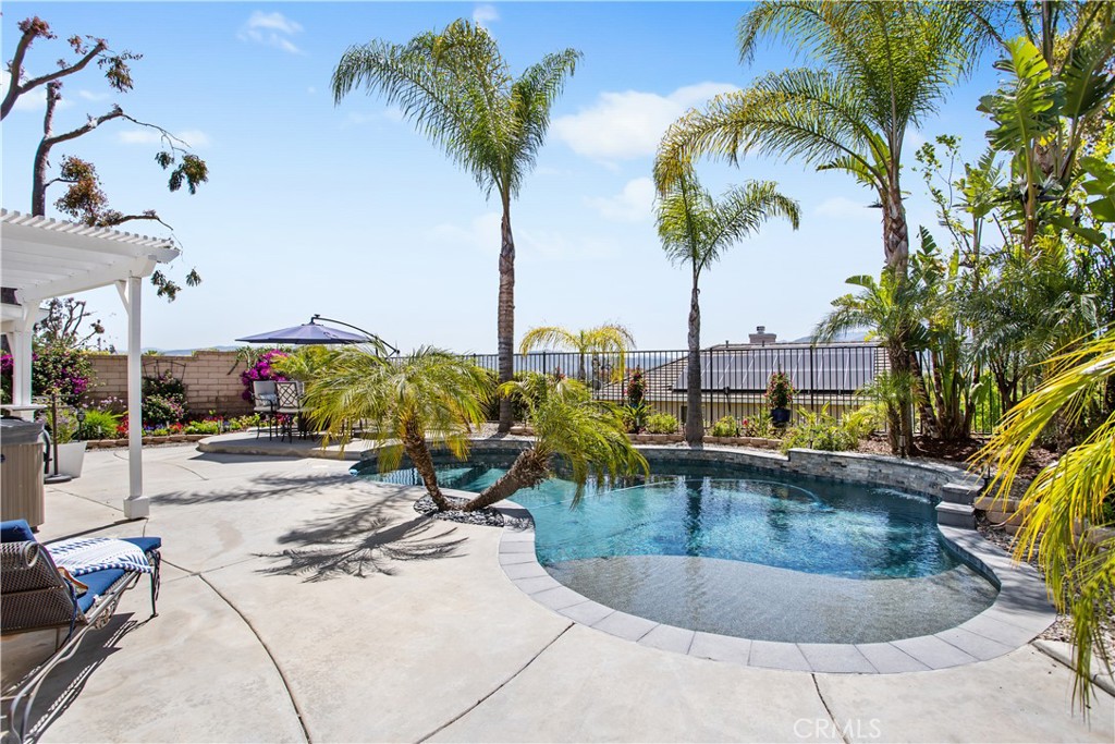 For buyers who won’t settle, this 5-bedroom, 3-bathroom home in Crowne Hill delivers. Immaculately maintained and move-in ready, it showcases panoramic views, a resort-style pool with Baja shelf, above ground spa, lush tropical landscaping, and a covered patio ideal for year-round entertaining.
Inside and out, the home has been thoughtfully refreshed—including a newly painted exterior and updated interior paint, newer flooring, upgraded HVAC, lighting, Nuvia Pro whole house water system, and near new water heater. The open-concept kitchen features granite counters and modern appliances. The flexible layout includes a downstairs bedroom and full bathroom for maximum versatility.
With major improvements already done, this home offers peace of mind, modern comfort, and the lifestyle today’s buyers expect. Low-HOA and no mello roos taxes plus top-rated schools, parks, and proximity to Temecula wine country make this an opportunity you don't want to miss!