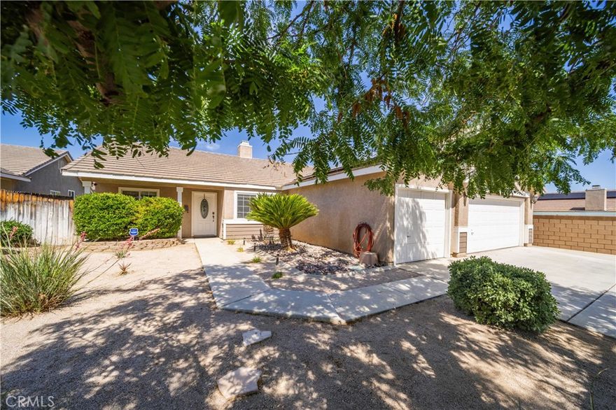 Imagine coming home every day to your own personal retreat. This stunning 4-bedroom, 2-bath pool home, nestled on an oversized cul-de-sac lot directly behind Sundown Elementary, is designed for both blissful relaxation and effortless entertaining. The heart of this home is its completely redesigned kitchen, a true chef's dream.  Featuring upgraded soft-closing cabinets, a floor-to-ceiling pantry, an extra-large island for abundant storage, and stainless steel appliances (including the refrigerator!), this space is as functional as it is beautiful. It seamlessly flows into the family room, with tile floors throughout the main living areas creating an open and connected ambiance—perfect for gatherings of any size. Step through the French doors from the kitchen onto a patio that spans the entire length of the home. Here, you'll overlook a spectacular backyard oasis boasting a lush lawn and a vinyl-gated pool and spa. With ample space for various activities or even adding an ADU, your outdoor possibilities are endless.  Beyond the main living areas, you'll discover even more to love. The 3-car garage offers a unique pull-through option with a third door leading to a concrete slab, shed, and plenty of room for your recreational vehicles. Plus, with 30amp on the side of the garage for your RV and solar panels keeping your power bills low, this home truly has it all. This isn't just a house; it's an opportunity to embrace a lifestyle of comfort, convenience, and endless enjoyment. Don't let this incredible gem pass you by!