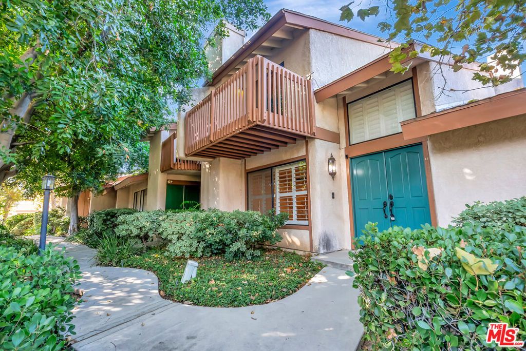 Photo of 8558 De Soto Avenue #41, Canoga Park, CA 91304 (MLS # 25582749)