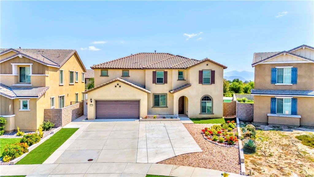 Welcome to this stunning two-story home offering 5 bedrooms, 4 bathrooms, and 3,317 sq. ft. of living space on a 7,405 sq. ft. lot. Designed for both comfort and style, the home features a spacious game room, upgraded cabinets and flooring, and a covered patio perfect for entertaining.
The gourmet kitchen boasts stainless steel appliances, a huge center island, and a dining area that opens seamlessly into the family room. The luxurious master suite includes a walk-in closet and a private bath, creating the perfect retreat. And EV cars charging, a soft water system, and PAID-OFF SOLAR.
Outdoors, enjoy a water-efficient front and backyard, complete with a gated dog run. The fenced area for the dog which can be easily removed. The nature seen from the backyard provides a daily moment of rest.
Serrano Ranch, located in Jurupa Valley near the 60, 15, and 91 freeways, offers convenience with a nearby Metrolink station in Corona providing easy access to the greater Los Angeles area. Residents can take in panoramic Southern California views, enjoy year-round warm weather, and explore endless outdoor activities, including golfing and mountain hiking. Dining, shopping, and entertainment are just minutes away. The community also features a future neighborhood park, with more than 13 parks and over 234 acres of parkland within the JCSD Parks territory.
This beautiful home is move-in ready—don’t miss your chance to make it yours!