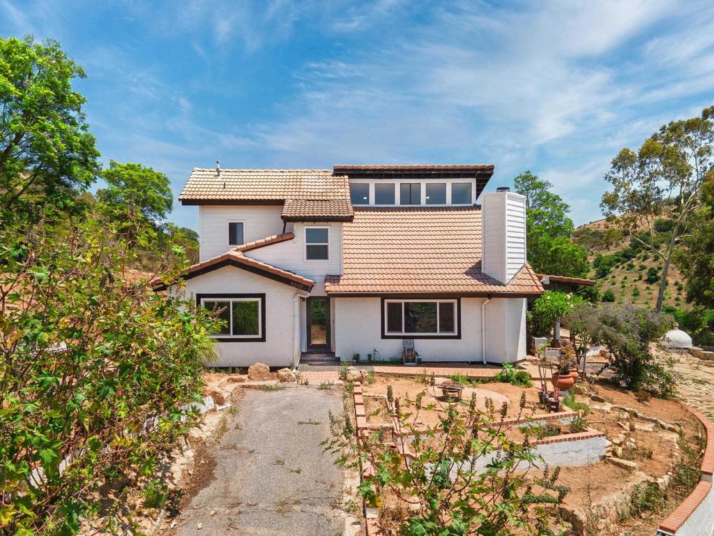 Endless Potential on a fully fenced, 10+ Acre Opportunity in the Heart of Fallbrook. Welcome to your private hilltop retreat, a beautifully remodeled 3-bedroom, 2.5-bathroom home on 10.6 acres of lush, usable land in scenic Fallbrook. Spanning just over 2,500 square feet, this home was fully renovated in 2024 and offers panoramic views, serene privacy, and room to grow.. literally. The land has been lovingly cultivated and features a wide variety of fruit and vegetable trees, making it ideal for homesteading, gardening, or simply enjoying your own slice of nature. The property is fully gated, solar-powered (paid off!), and includes a home and termite inspection for peace of mind. What truly sets this home apart are the approved plans for a stunning expansion: the opportunity to convert the existing home into a 6-bedroom, 4.5 bathroom estate with a large walkout balcony, plus a detached 2 bedroom, 1 bathroom ADU. Whether you're looking to build a multigenerational compound, create a retreat-style escape, or invest in rental income potential, the groundwork has already been laid. Fallbrook is known for its charm, privacy, and natural beauty, and this property is the perfect blend of move-in-ready comfort and future possibility. Plans are available for review upon request. This is a rare chance to own acreage, views, and value in one of North County’s most desirable rural communities. To be sold AS-IS.