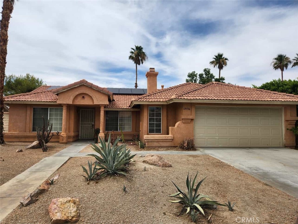 Rare Opportunity! This 3-bedroom, 2-bath single-story home in Cathedral City features a two-car attached garage, cozy fireplace, central HVAC, and a SOLAR ENERGY system, offering eco-friendly living and long-term utility savings. Outside, you'll find low-maintenance desert landscaping, perfect for enjoying the desert lifestyle without the upkeep. Located near local schools, parks, and shopping centers. Whether you're looking to settle in or invest, this location offers easy access to everything Cathedral City has to offer. The home could use a little updating, but that’s where the opportunity lies. Great for buyers looking to reimagine their own space.