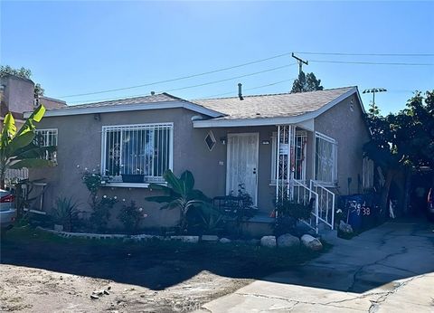 Photo of 1238 E 100th St, Los Angeles, CA 90002 (MLS # PW25252132)