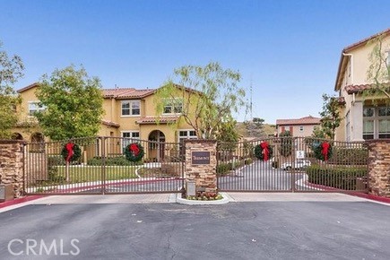 Welcome to Tremont - a small gated community that backs to the Santiago Oaks Regional Park in the Serrano Heights area of Orange. Tremont appeals to a variety of lifestyles from serene to active. Steps to parks, picnic benches, hiking, bike trails and Anaheim Hills Elementary. Minutes to Nature Center, restaurants and shopping, and a good Driver (maybe 3) away from AH Golf Course. Tremont is a newer, well maintained community. Tuscan facades with tri-level interior designs, tall ceilings in the fireside living room with an open kitchen/dining/family room floor plan. All 3 bedrooms, 2 baths and laundry room upstairs. Direct-access two-car garage with storage. The home is in very nice, pride of ownership condition. Hardwood flooring throughout. Includes refrigerator, washer and dryer. Guest parking - for guests. Tenants limited to two cars and must park in garage. Great school district. Safe. A wonderful place to live.