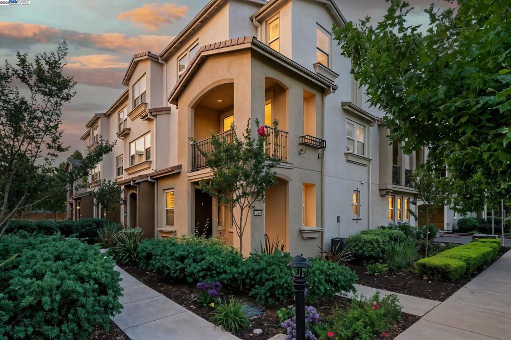 Welcome to 2702 Urbino, a beautifully maintained 3BR/3.5BA townhouse-style condo in San Jose's desirable Communication Hill. Built in 2015 by Lennar, this east-facing home offers fresh interior paint, stunning mountain views, and a functional tri-level floor plan. Enjoy an upgraded kitchen, elegant wood flooring, and abundant natural light throughout. The entry level includes an office/guest bedroom suite, storage space, and an attached 2-car garage with epoxy floors, bike racks, and a water softener. The main level features open living and dining areas, a private balcony, and a modern kitchen with ample counter space, generous cabinetry, and high-quality finishes. Upstairs, you'll find a laundry area, a secondary suite, and a spacious primary suite with a walk-in closet and built-in shelving. Each bedroom has its own full bathroom. Additional highlights include a triple-zone thermostat, reverse osmosis drinking water system, and whole-house water softener. Conveniently located near Monticello shops, dining, parks, schools, major Silicon Valley employers, and public transit, with easy access to Downtown San Jose.