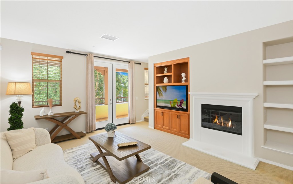 Motivated Seller! Step into 23 Crosspointe, a beautifully upgraded tri-level townhome in one of Irvine’s most sought-after neighborhoods. The flexible layout begins with a private entry-level bedroom suite, complete with a full bath and direct garage access. Upstairs, the light-filled living room boasts soaring ceilings, a cozy fireplace, custom built-ins, and a balcony overlooking the community park. The gourmet kitchen is designed for both style and function, featuring a center island, stainless steel appliances, a built-in refrigerator, a subway tile backsplash, and sleek cabinetry. The primary suite offers a peaceful retreat with a walk-in closet and a spa-inspired bathroom showcasing dual vanities and an oversized shower. Meticulously maintained and move-in ready, this home includes access to resort-style amenities such as pool, spa, tennis courts, fitness center, playgrounds, and scenic walking trails. With award-winning Irvine schools and unbeatable proximity to shopping, dining, and major freeways, this is the perfect blend of comfort, convenience, and community. Don’t miss this one — priced to sell quickly!