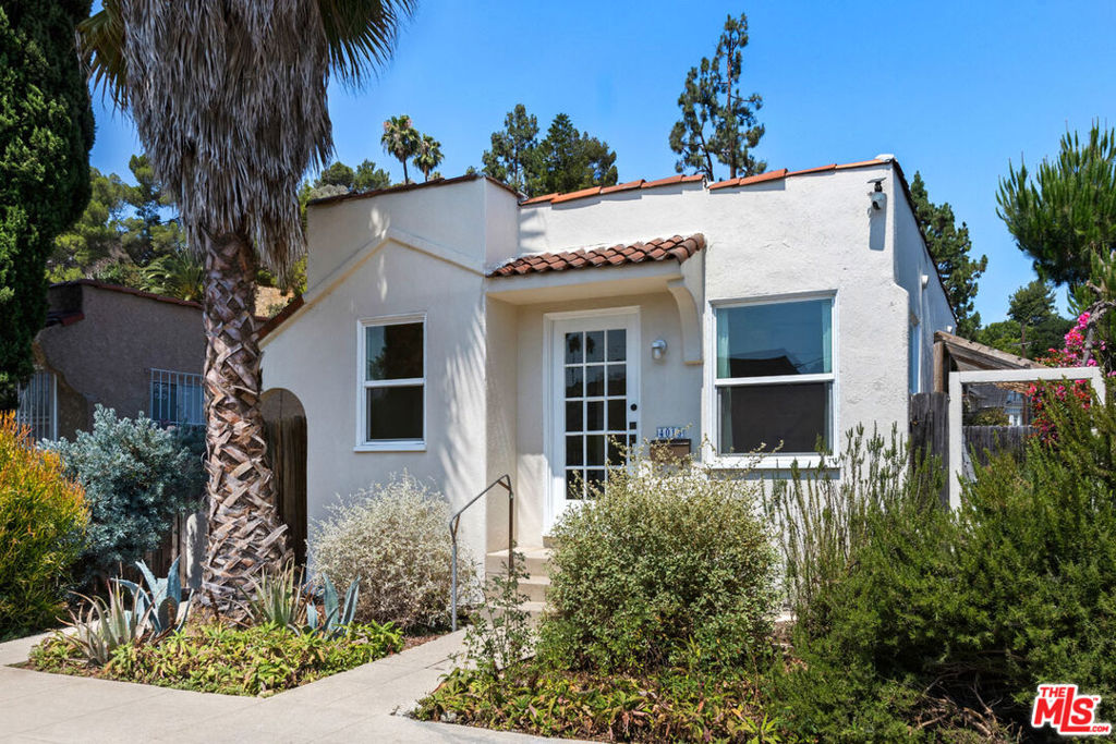 Trendy Highland Park sets the scene for this bright and charming Spanish bungalow on a quiet cul-de-sac. California flora welcomes you home, where you'll find period built-ins, oak floors, and abundant sunlight. Heritage spirit lives on in the kitchen with a restored 1949 Sears sink unit in emerald and blue, a period-style refrigerator, and a cozy breakfast nook for morning coffee. The bedroom has a nicely sized closet, and the updated bathroom features glass tile and a soaking tub. Landscaped with native plants, the backyard is your private garden retreat with a patio for al fresco dinners and BBQs with friends. The three-car garage with its own APN presents future possibilities, a flexible space you can make your own. The great location puts you close to local favorites Kitchen Mouse, HiPPO, and Arroyo Club, with Hermon Park tennis courts and the scenic hiking trails at Debs Park just minutes away.
