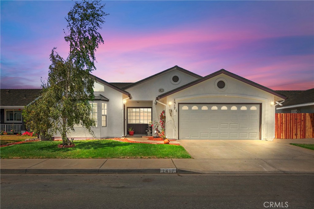 Welcome to your new home at 1417 Paseo Jacaranda, Santa Maria in the Paseo Del Sol Community! This charming single-family residence offers a spacious 1,923 square feet of living space, featuring 3 comfortable bedrooms and 2 well-appointed bathrooms. Step inside to find a bright and welcoming environment, thanks to the elegant bay windows and skylights that bathe this home in natural light. The home boasts a tasteful mix of tile and laminate wood flooring, providing both style and durability. The heart of the home is undoubtedly the kitchen, equipped with sleek stainless steel appliances, a custom hood, a large island, and a gas stove, perfect for culinary enthusiasts. The adjacent dining area and living room with a cozy fireplace make an ideal setting for entertaining guests or enjoying quiet family evenings. Retreat to the updated primary en-suite bathroom, featuring double sinks and a walk-in tiled shower, offering a touch of luxury and convenience. The guest bath also boasts dual sinks and granite countertops.
The outdoor space is designed for both relaxation and functionality, with a fully fenced front yard, covered patio, and a dog run, perfect for pet lovers. Enjoy year-round comfort with upgraded central heating, and take advantage of the included washer and dryer for added convenience.
This home is a perfect blend of comfort and practicality, ready to welcome you into a vibrant community. Don't miss the opportunity to make this delightful property your own