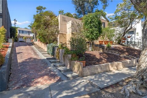 Photo of 1285 South Dunsmuir Ave, Los Angeles, CA 90019 (MLS # RS25267599)