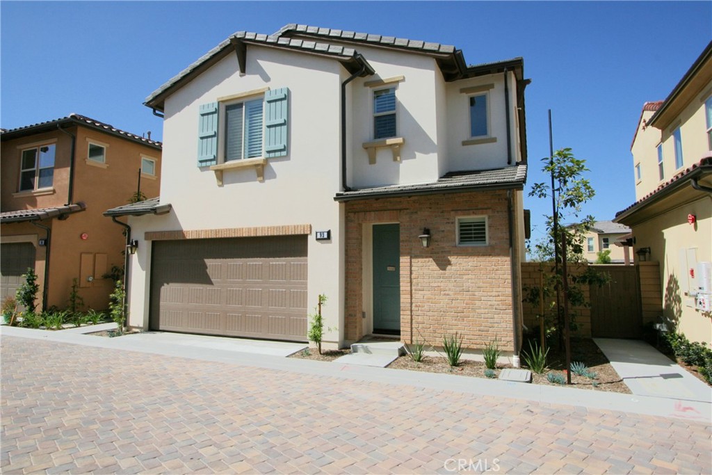 Experience modern luxury living in this newer home with a premium ridgeline location offering breathtaking mountain views at The Peake by Shea Homes. This beautifully upgraded 3-bedroom, 2.5-bath residence showcases an open-concept Great Room floorplan that seamlessly blends style and functionality. The chef’s kitchen features sleek quartz countertops, upgraded white Shaker cabinetry, designer hardware, and a GE stainless steel appliance package. Additional upgrades include contemporary flooring, 5.5” baseboards, recessed lighting, enhanced insulation, and custom two-tone paint throughout. Upstairs, you’ll find spacious bedrooms, including a luxurious primary suite with dual sinks, a designer tile shower, and two large closets. The upstairs laundry room offers abundant storage, a sink, and washer/dryer hookups for ultimate convenience. Step outside to your extended backyard retreat with stone flooring and serene mountain views—perfect for relaxing or entertaining guests. Enjoy resort-style living at Baker Ranch, featuring lagoon-style pools, tennis courts, walking trails, parks, BBQ and picnic areas, spas, children’s splash zones, sports courts, and a beautifully appointed Clubhouse.