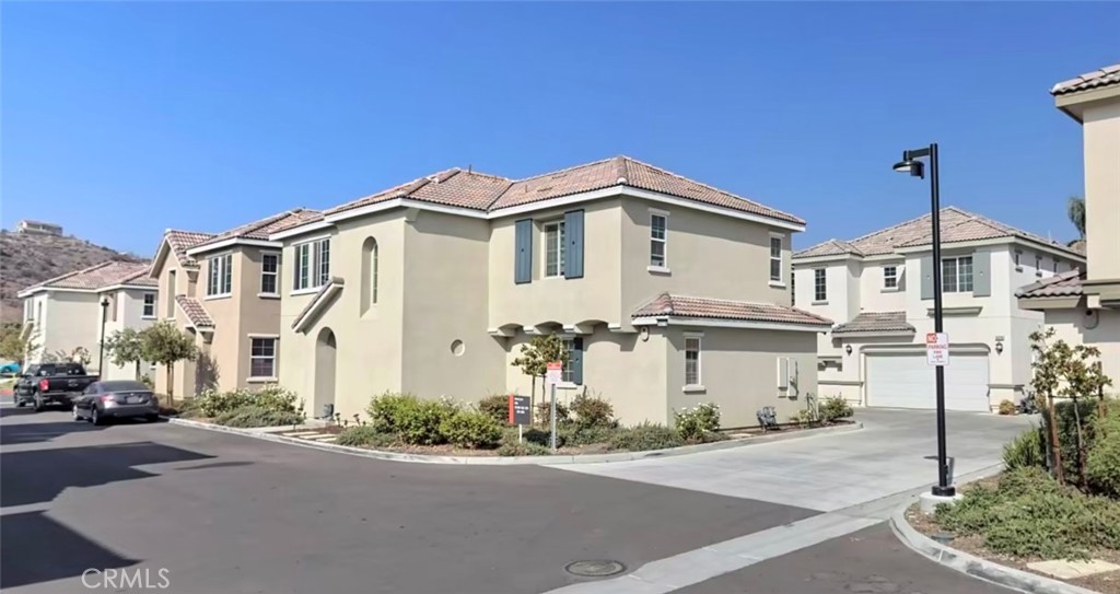 Recently Leased – Steps from Cal State San Bernardino!
Well-maintained and move-in ready, this detached condo home is just a minutes walk to Cal State San Bernardino. The open-concept main level features a spacious kitchen with large island, ample cabinetry, and direct access to the attached two-car garage. Upstairs offers a versatile bonus area—ideal for a family room or home office—plus a convenient laundry room. The primary suite includes a dual-sink vanity, glass-enclosed shower, and walk-in closet. Two additional bedrooms share a full bath with dual sinks. Enjoy the private backyard, perfect for outdoor dining and relaxation. Prime location, functional layout, and modern finishes throughout.