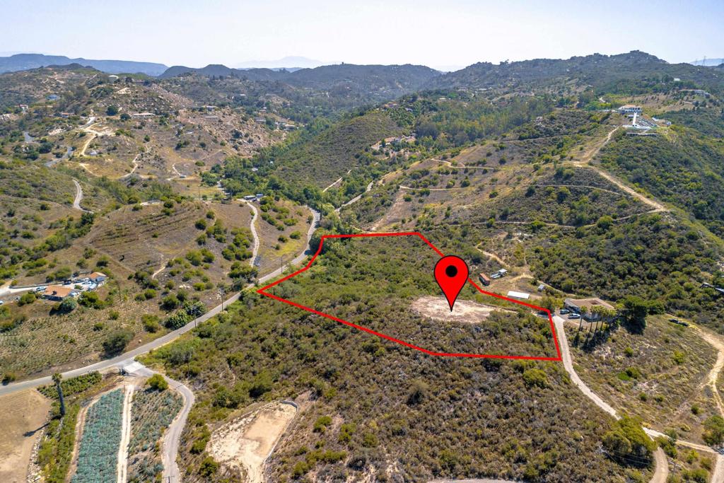 15% down financing source available! 6.73 Acres with Rough Pad & Panoramic Views! Experience the charm of country living in the outlier of the De Luz Heights neighborhood of Fallbrook. With a .25 Acre (±) rough pad already in place, this property offers potential for a boutique farm, a vanity vineyard, a custom home -- or all three! Make sure to check out the virtual tour! ** Buyer to verify utilities, land use, and development feasibility with the appropriate agencies. Boundary lines in photos are representative only and are not 100% accurate.** Check images for directions