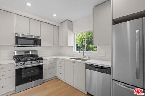 Photo of 420 S Sepulveda Boulevard #3, Los Angeles, CA 90049 (MLS # 26875619)