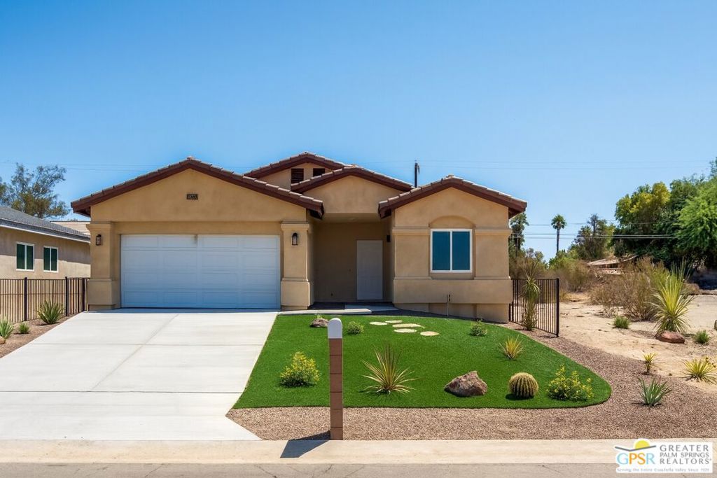 Welcome to this brand-new contemporary home in Desert Hot Springs, where modern design meets comfort and convenience. This single-story residence features an open-concept layout with stylish wood-look tile flooring that flows seamlessly throughout the living spaces. Clean lines and modern finishes create a sleek, inviting atmosphere, while central heating and air conditioning provide year-round comfort. The thoughtfully designed kitchen opens to the living and dining areas, making it ideal for entertaining or relaxing at home. A special highlight of this property is the private guest quarters, offering flexibility for visiting family, friends, or even a home office. With its combination of contemporary elegance, practical design, and the ease of single-level living, this home is move-in ready and perfectly situated to enjoy everything Desert Hot Springs has to offer.