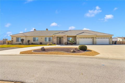 Photo of 11885 Lamplighter Ln, Oak Hills, CA 92344 (MLS # CV26017442)