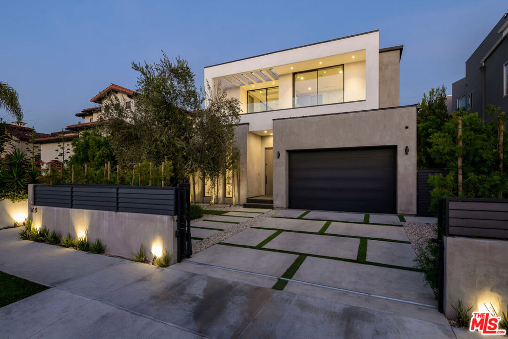 Located in one of LA's most desirable neighborhoods, this 4 bedroom, 5 bathroom modern estate blends high end design with thoughtful details and effortless indoor-outdoor living. The open floor plan is filled with natural light and features high ceilings and expansive sliding glass doors that lead to a private backyard retreat. The chef's kitchen is outfitted with top-of-the-line Miele appliances, sleek custom cabinetry, and a striking oversized Italian porcelain island, ideal for both everyday living and entertaining. Upstairs, the generous primary suite offers a private balcony, spa-like bathroom, and a huge walk-in closet. Outside, the backyard is an entertainer's dream with a pool, spa, cabana, and two fireplaces. The home also includes an alarm system for added peace of mind. Just minutes from The Grove, West 3rd Street, Beverly Hills, and West Hollywood, this is luxury living in the heart of the city. Offered unfurnished for a minimum one-year lease.