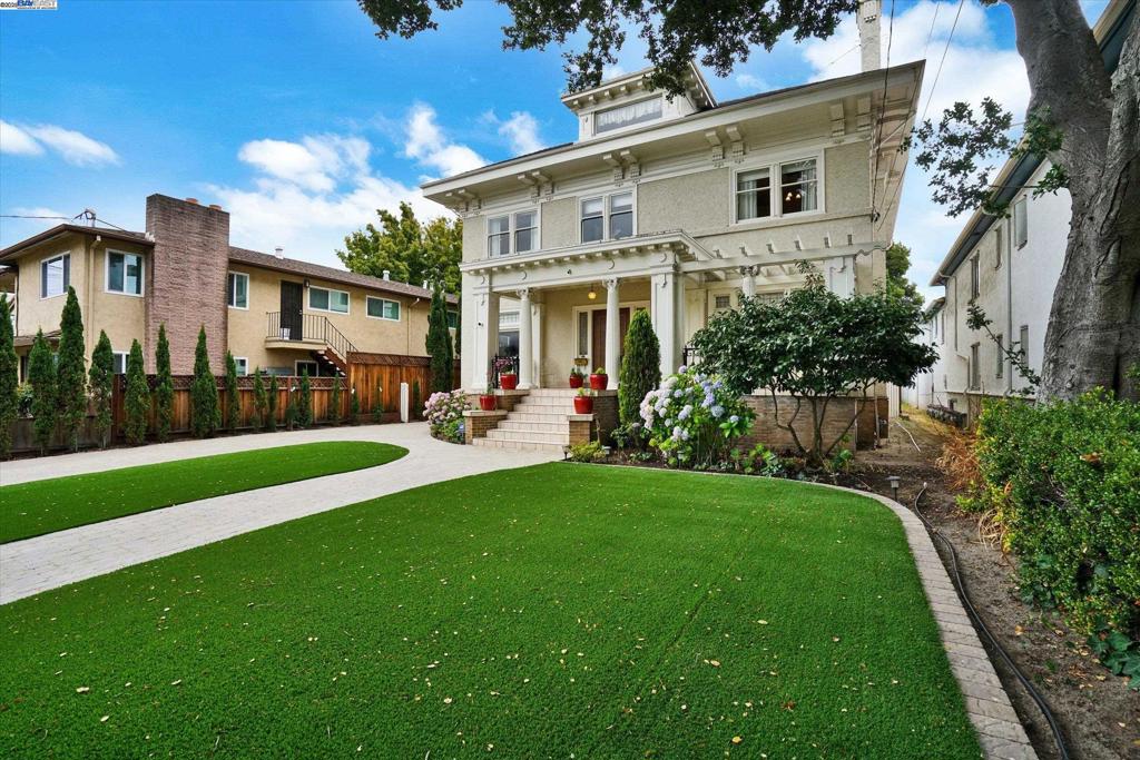 Stately Elegance Meets Everyday Livability. Built in 1912, this Colonial Revival masterpiece, designed by architect William Dufour, is his largest & most ambitious home. Set on a 11,000 sq ft lot, this grand Alameda property blends timeless craftsmanship with space and versatility that's rarely found today. With 5 spacious bedrooms, it offers room to grow, gather, and put down roots. Marvel at the exquisite architectural details—high ceilings, rich woodwork, oversized windows, and formal rooms built for entertaining. An eat-in kitchen connects to a classic butler’s pantry, which transitions to the formal dining room—perfect for hosting or everyday ease. Outside, the magnificent back garden is a true retreat—lush, private, and ideal for entertaining, play, or unwinding. A long driveway leads to a detached garage, ideal for an ADU conversion, workshop, or creative studio. Need more room? A giant basement offers bonus space today and the cavernous, unfinished attic is brimming with potential-the possibilities are endless. Explore Alameda and see why so many fall in love with island living. From its charming neighborhoods to its strong sense of of community, this is a place where connections run deep and the pace just feels right. Come see why this is your forever home.