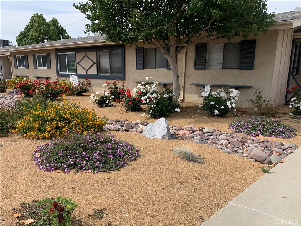 This home located at 26930 Augusta Dr., is a low maintenance single-story condo in the Sun City/Menifee 55+ senior community. Its major cross streets are Bradley R and Sun City Blvd for easy transportation access. Interior: This property features a good size 1066 square foot 2 bedroom, 2 bath, plus a sunroom. The good size sunroom can be used as a family room for friend/family gatherings. Its living room has 2 skylights allowing natural light in and has an open floor plan to the dining area. This living room also has an open kitchen counter with view into the kitchen. The single car attached garage has interior access from the inside for easy access. There is semi new flooring throughout and ceramic tile in the baths. Exterior. There is a covered patio in the backside of property attached to the sunroom where you can have your outside family BBQ'S to relax and enjoy. The long driveway has direct access into garage. Low maintenance yard is covered by HOA so you can sit back and enjoy without having to do the work. Community: This property is centrally located to banks, markets, stores, church, parks and more. The Sun City Civic Association also offers a variety of social activities to stay engaged with neighborhood and many amenities such as pools, an exercise room, gym, clubhouse, spa, fitness room, card room, shuffleboard, hobbies, arts and crafts, multiple classes and events for active senior citizens to enjoy. Augusta HOA fees include yard landscaping and maintenance along with water. You may call HOA and ask if you can purchase at any age as long occupants are 55 to live in unit.