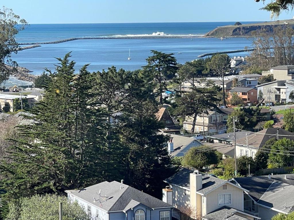 Vacant Lot located in El Granada, high enough up to enjoy a view! Located next to 1132 Columbus Street. Close to Quarry Park and El Granada Elementary School. Easy access to the Coastal Trail, Surfers Beach, Princeton Harbor and all the goodness of coastal living. Utilities at street Sewer allocated per Granada Sanitary, no water connection per Coastside Community Water District. Buyer to Investigate all aspects of potential including but not limited San Mateo County Building and Planning Dept, Cal-Fire, CCWD Coastside Community Water District (water) Granada Sanitary District (sewer) Go up Isabella Ave turn right onto Columbus Street sign located on the right. Just a few houses up from the corner. A 2,832 Sq. Ft. lot.