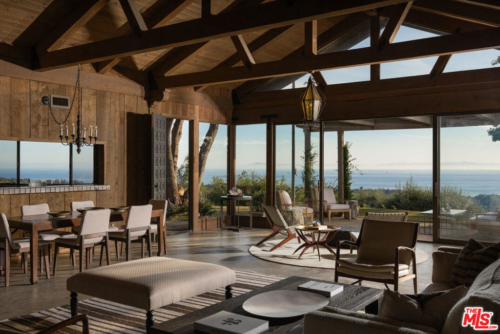 Nestled in the foothills of Montecito, this vast 21.22-acre estate unveils sweeping panoramic ocean views, creating the perfect backdrop for your dream retreat. Built in the 1970s, this 3-bedroom, 2-bathroom home offers a timeless layout with 70's charm where expansive windows invite natural light and the beauty of the surrounding landscape. Rich wood paneling creates warmth and texture, while the open layout offers endless potential for both relaxed living and entertaining. Embrace the rare opportunity to make this extraordinary piece of Montecito your own private sanctuary.
