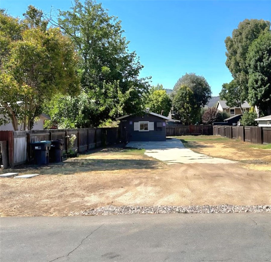 Structure was originally built as a garage and converted without permits to a 1 bedroom and 1 bath house. It may be land only value. The location is near Old Town Murrieta. Attention contractors--this is a great location for a new house!