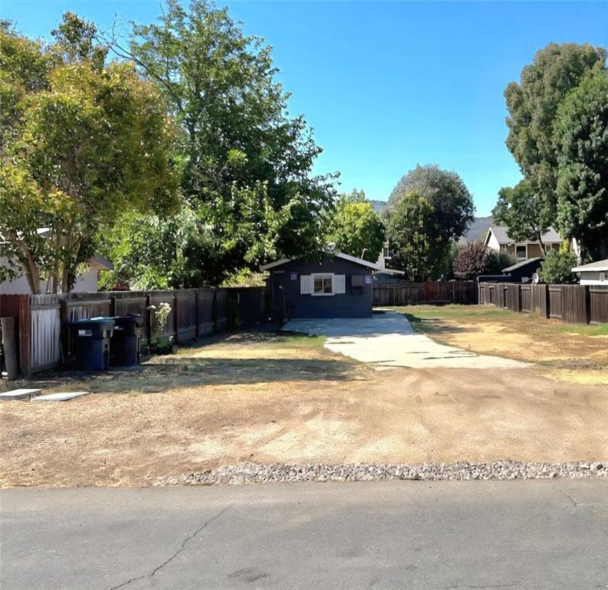 Structure was originally built as a garage and converted without permits to a 1 bedroom and 1 bath house.  It may be land only value.  The location is near Old Town Murrieta.  Attention contractors--this is a great location for a new house!