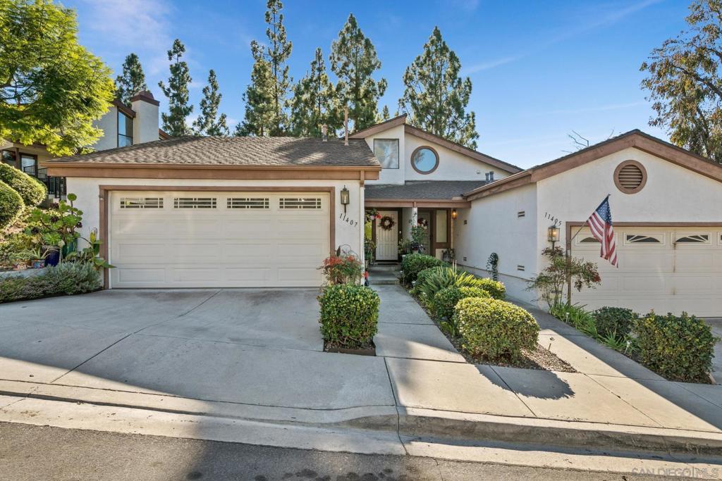 Set high in the coveted hills of Tierrasanta, this rare residence offers a lifestyle that feels both secluded and connected. With two generous bedroom suites and a versatile den/office, it’s designed for those who value both comfort and flexibility. Just one block from Mission Trails Regional Park, morning hikes, golden sunsets, and serene nature trails are practically at your doorstep—yet you’re only minutes from the city’s best shopping, dining, and beaches. Multiple balconies and a wrap-around brick patio invite you to savor soft breezes, mountain silhouettes, and the glow of city lights, while inside, soaring 28-foot vaulted ceilings, skylights, and a marble-framed fireplace create an airy, sun-drenched retreat. The chef’s kitchen, anchored by a professional-grade Wolf range, stainless steel counters, and a charming garden window, makes every meal a pleasure. Every detail is crafted for livable elegance. Each bedroom suite offers its own private bath, with one featuring a Grecian soaking tub framed in mirrors and bathed in natural light. The den/office is perfect for creative work, quiet reading, or hosting guests. Unique to Sunset Ridge, this home offers both an upper-level deck and rare dual entry points from the street and common area—enhancing ease of access and indoor-outdoor flow. With central A/C, low HOA fees and generous storage including a large attic above the two-car garage, this is a sanctuary where refined design meets the freedom of the outdoors.