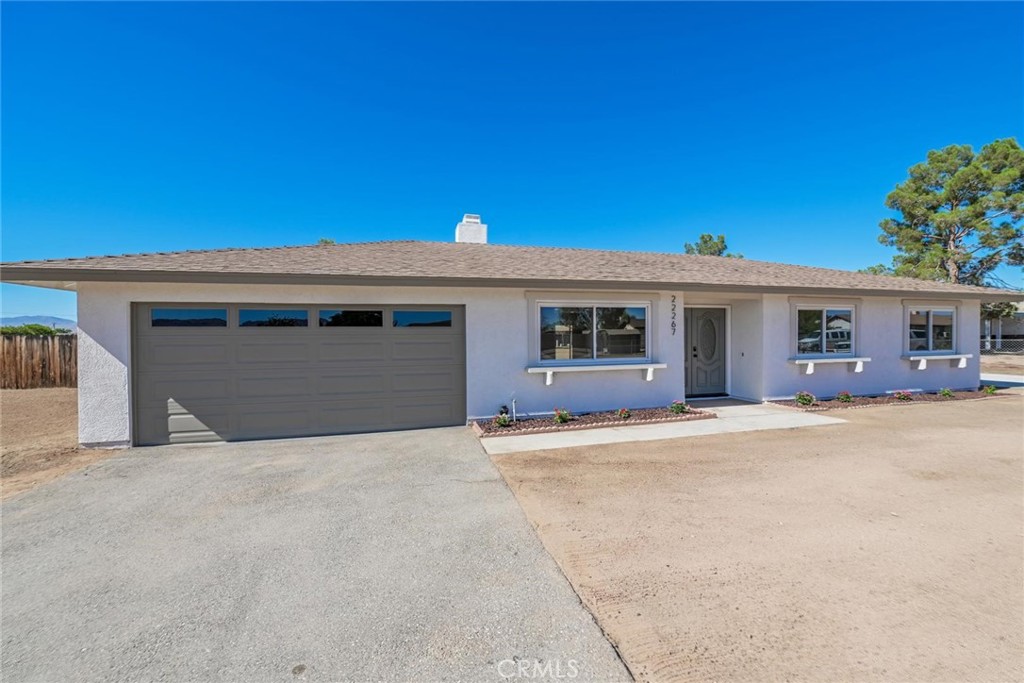 Beautifully Updated Home on Expansive Corner Lot in Prime Apple Valley Location!
Welcome to 22267 Gayhead Rd — a stylishly remodeled 3-bedroom, 2-bath home located in the heart of Apple Valley’s sought-after 92307 zip code, known for its peaceful atmosphere, spacious lots, and proximity to schools, parks, and shopping.
This charming home features an open floor plan filled with natural light. The spacious living room boasts a dramatic fireplace, flowing seamlessly into the dining area and a fully updated kitchen with new quartz countertops, modern backsplash, and brand-new stainless steel appliances.
Enjoy new laminate flooring throughout, new carpet in the bedrooms, and updated light fixtures. The primary suite includes a walk-in closet and a remodeled en-suite bathroom, offering a private retreat.
Sitting on a massive 21,000 sq ft corner lot, the backyard is perfect for a pool, RVs, or outdoor toys — a blank canvas for your dream setup. The neighborhood is quiet and well-maintained, with wide streets and a welcoming community vibe.
With its blend of comfort, style, and location, this home is a rare find and won’t last long!
