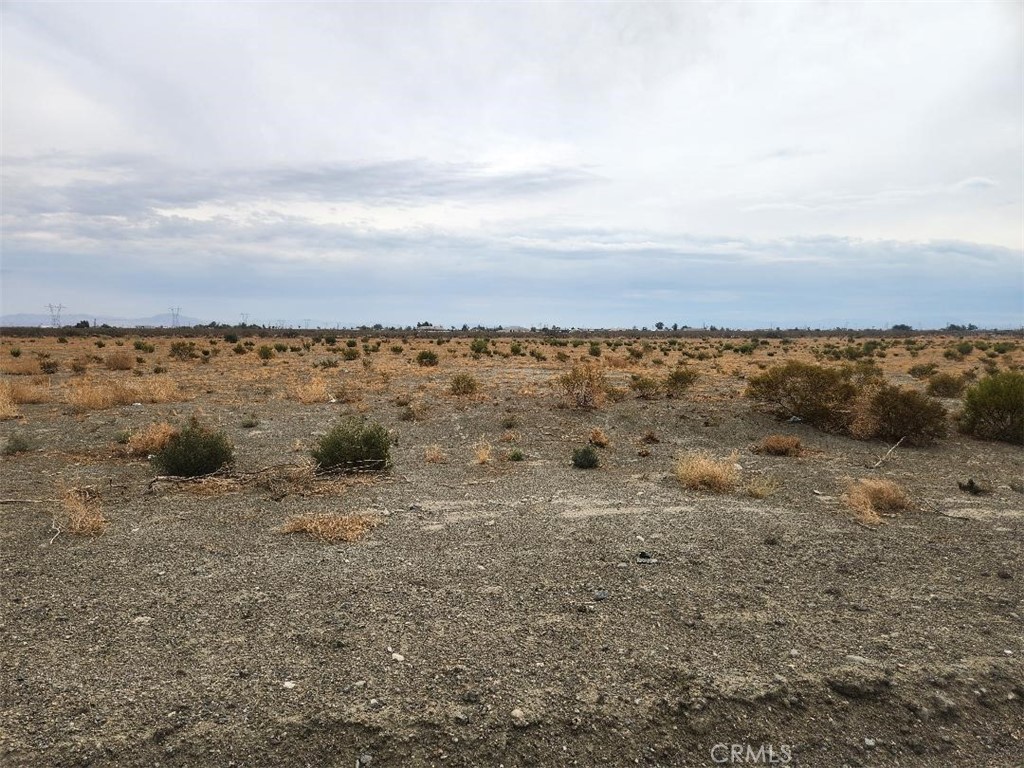 Great Flat 9.68 Acre lot off paved Sheep Creek Rd. Electricity adjacent. Easy access not far North from HWY 18/Palmdale Rd. Makes communting easy to El Mirage, Phelan, LA, Adelanto. Water fill station is close. Excellent views of the mountains and desert from this location.