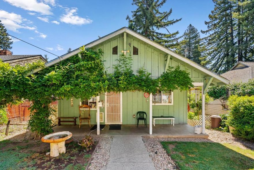 Amazing!!! Price reduction AND new permitted septic system completed - yay!!! Discover the charm of Boulder Creek with this inviting home, offering a comfortable 1,104 sq ft of living space. The property features three bedrooms and two full bathrooms, including a full bath on the ground floor, a shower over tub, and a stall shower. The kitchen is well-equipped to meet all your culinary needs and opens onto the rear deck. The living area is large and flows into the kitchen/dining area. Additional amenities include convenient in-home laundry facilities, making household chores more manageable. The home is set on a generous lot of approximately 6,229 sq ft, providing lots of outdoor space for various activities.This residence falls within the San Lorenzo Valley Unified School District, serving the educational needs of young residents. Whether  you're enjoying the comfort of the interior or the spaciousness of the exterior, this Boulder Creek home offers a wonderful opportunity for those seeking a balanced lifestyle.