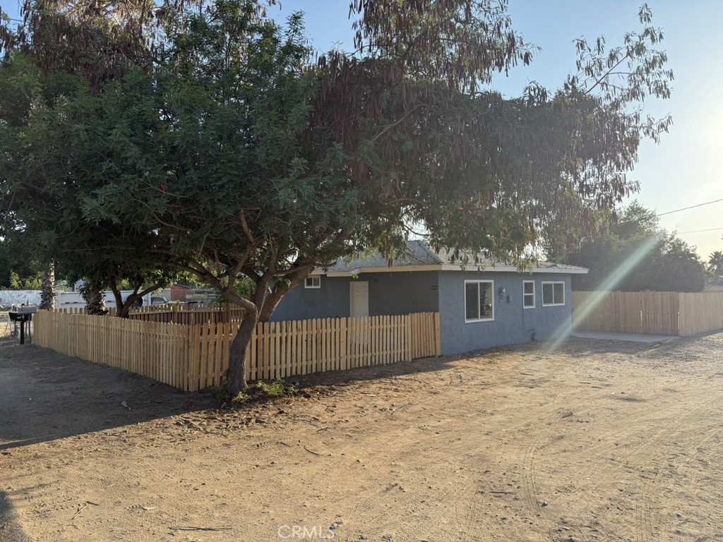 Look at this one! This perfectly priced single level home has just been completely remodeled. Owners have spared no expense. This lovely 2 bedroom 1 bath home comes with an attached single car garage and a completely fenced in humungous rear yard. It is perfect for securely parking your vehicles, storage or entertaining. Property shares driveway with next door units that are currently being renovated. The timing is excellent as most of the neighboring properties are now owner occupied and have or either are completing rehabbing and upgrading. Close to schools, shopping and transportation this property will not last.