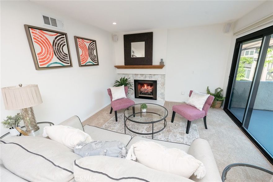 Lovely 3 Bedroom 2 Bathroom Upper-Unit Condo. This Ultra Spacious home features an Open Concept with New Flooring, Quartz Counter tops, Stainless Steele Appliances, A Cozy Fireplace, Recessed Lighting, Some Updated Plumbing, New Fixtures, Triple Pane Windows & Designer Paint. The Primary Bedroom features an En-Suite Bath with Dual Sinks. The home boast's of, Not One but Two balconies and a separate Parking Garage. Located in a quiet, lush community with plenty of trees, green spaces and a sparkling pool to lounge around during the warm weather.  Just Minutes from Shopping and Dining in Downtown Burbank, Several Studios, the NoHO Arts District,  the Hollywood Burbank Airport and Freeways onramps.