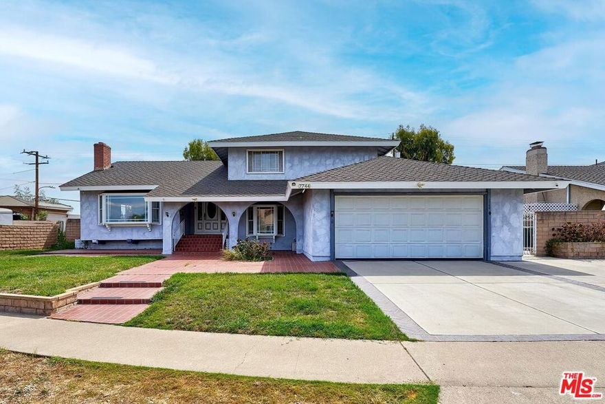 Beautifully updated 5-bedroom, 3-bath single-family home located in a desirable Buena Park neighborhood bordering Fullerton. This spacious residence offers a well-designed floor plan featuring a large family room with a fireplace, a convenient downstairs master suite, and a bright living room with neighborhood views. The newly remodeled kitchen showcases an oversized island, ample cabinetry, and modern finishes, ideal for today's lifestyle. A fully remodeled restroom is conveniently located next to the living room. 4 additional bedrooms and a full updated bathroom upstairs. Attached 2-car garage with a direct access. Additional highlights include possible RV parking, an extra-large driveway with room for multiple vehicles, and a flat backyard with a covered patio perfect for outdoor entertaining. Situated minutes from premier shopping, dining, and schools. Don't miss out the chance to own this gem in the most desirable Buena Park neighborhood.