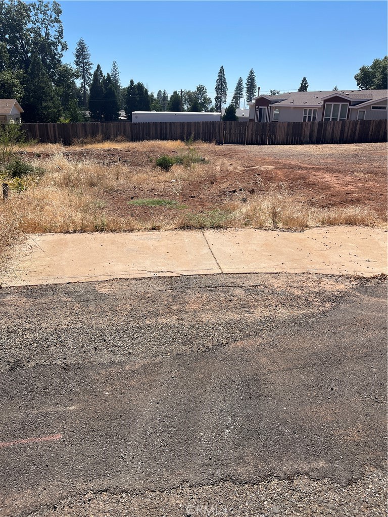 Located on a quiet cul-de-sac in the peaceful Lower Magalia community, Babson Court offers a beautiful ±0.24-acre parcel surrounded by open space with tall pines and natural beauty. This nearly level lot provides an ideal setting for building a custom home, with assumed access to public water, electricity, and conventional septic. As part of the Paradise Pines Property Owners Association, the lot includes access to a wide range of amenities such as a community clubhouse, swimming pool, spa, tennis courts, playground, and scenic walking trails. Whether you’re looking to build a full-time residence or a vacation getaway, this property offers a serene mountain lifestyle in a friendly, forested neighborhood just minutes from shopping, services, and outdoor recreation.