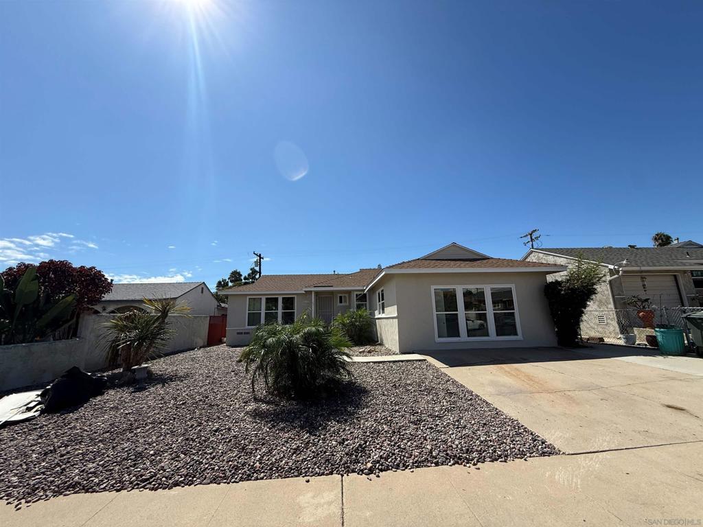 This bright and inviting home was just remodeled! Offering the perfect mix of comfort and convenience, close to great schools, downtown, naval bases, shopping and more! Inside, you’ll find spacious bedrooms filled with natural light, newer windows, ceiling fans, and updated flooring and paint that give the space a fresh modern feel. The kitchen comes with plenty of cabinet space, a stylish backsplash, and essential appliances, making it ready for everyday living. Garage has been converted into a bonus 4th room/bonus/office with half bath for added flex space! Step outside to a private backyard with fruit trees that’s great for entertaining, gardening, or simply enjoying the California sun. The front yard is designed with low-maintenance landscaping and a wide driveway for easy parking. Living here means quick access to school since it's located next to Harbison Elementary School, shopping, dining, and major freeways. You’re just minutes away from Downtown San Diego, beautiful beaches, and local parks, so you get the best of both city life and neighborhood charm.