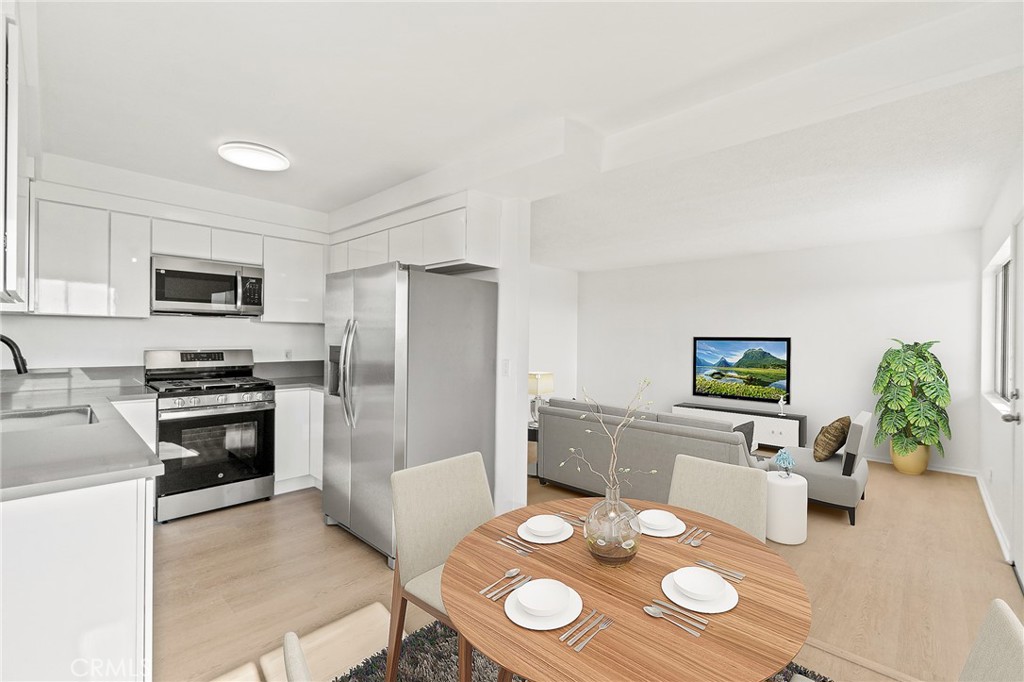 Welcome to this beautifully remodeled upper corner two-bedroom, one-bath condo in Inglewood Manor, offering abundant natural light and sweeping city and treetop views. With its private exterior entry and elevated position, this home combines comfort, privacy, and convenience.
The open living room is framed by large windows, while new vinyl flooring flows throughout. The fully remodeled kitchen features soft-close cabinets, quartz countertops, and stainless steel appliances, with a dining area ideal for both daily meals and entertaining. Both bedrooms are generously sized with large closets, and the bathroom has been refreshed with a new vanity and modern lighting. Extra hallway storage adds even more functionality.
This particular unit also offers exceptional security with powered metal roller shields on accessible windows and a reinforced metal security screen door. The well-maintained community provides secure subterranean parking, shared laundry facilities, and low HOA dues.
Located near SoFi Stadium, The Forum, LAX, shopping, dining, and major freeways, this move-in-ready home is an outstanding opportunity in a prime Inglewood location.