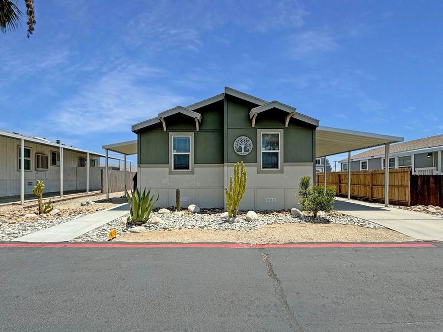 Welcome to Palm View Estates Mobile Home Park, an all-ages community. This 2017 double-wide manufactured home in Desert Hot Springs offers 3 bedrooms and 2 baths. The open concept living area is perfect for entertaining. Recent upgrades include a new air conditioner installed 8/17/22 and water heater installed 9/9/22 to ensuring comfort and efficiency. Palm View Estates features amenities such as a refreshing pool, relaxing spa, and clubhouse. Conveniently located near highway 62, you'll have easy access to the I-10 Freeway, Palm Springs, Joshua Tree, other local attractions, dining, and shopping. Schedule a viewing today and experience the best of Desert Hot Springs living! *Space rent for new buyer will be approximately $1,250. *