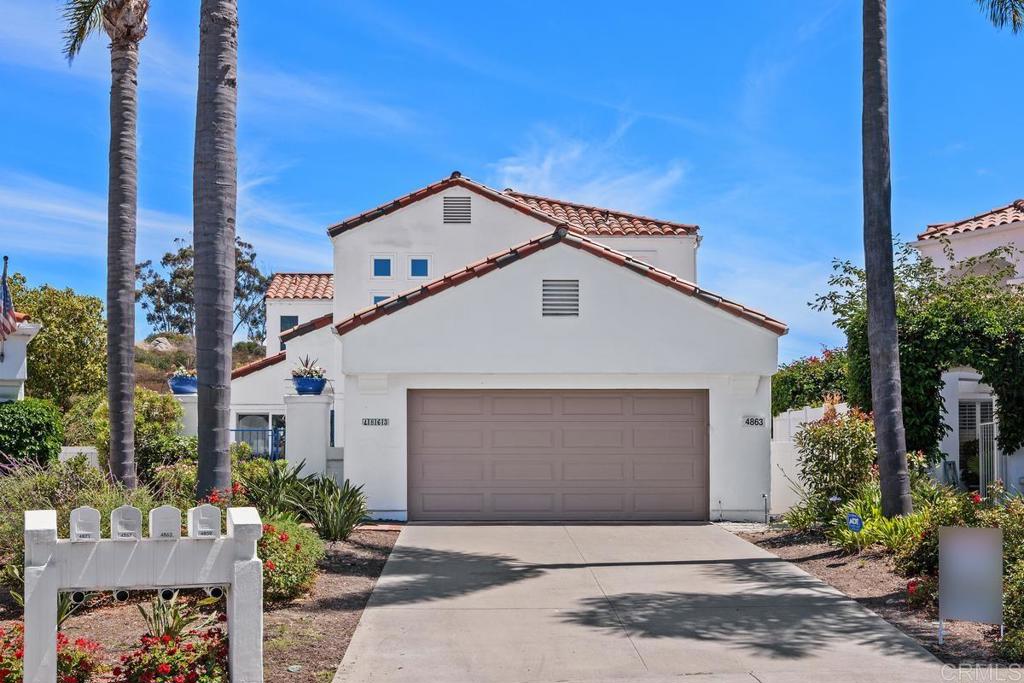 Lots of natural light, this San Remo model, on a large, pie-shaped lot, backs to wide open spaces and has ocean and sunset views. Every square inch of this home has been remodeled and updated. Upon entering the home you will love the feeling of openness as your gaze travels to the custom,"Heat and Glo" limestone fireplace on the adjacent wall. Continue on to the light-filled dining room which has french doors leading out to the wrap-around patio. Walls have been moved to create an expansive kitchen featuring custom cabinetry, granite countertops, two large islands and Viking appliances. A slider has been added to access the outdoor dining area which is covered by the wrap-around balcony on the second floor. Every bathroom has been updated-Custom cabinetry, granite counters, beautifully tiled surrounds for the showers and bathtubs, new toilets, sinks, faucets and light fixtures. There are updated light fixtures and recessed lighting throughout. All three bedroom are en suites. The primary bedroom has an enlarged, walk-in closet with an abundance of storage. The upstairs guest room is being used as an office. There is an added room upstairs not in the original San Remo models, currently used as a sewing room. Dual-paned windows and sliders throughout the home. The outdoor living space features a wrap-around, concrete stamped patio with several outdoor entertaining spaces, a custom, built-in fountain, a putting green, a covered dining area with ceiling fans and is wired for a TV, if you so desire. Top this off with the built-in BBQ. The upstairs wrap-around balcony/deck is great for relaxing and enjoying the spectacular ocean and sunset views. This home is backed by a luscious succulent garden with accent boulders. Behind this are wide, open spaces. The Ocean Hills Country Club is a 55+ retirement/Resort style living community. It has an 18 hole executive golf course, Jr. Olympic, solar-heated, salt water swimming pool, tennis, pickleball, bocce, paddle ball, shuffleboard, croquet, dog park, a 2 1/4 mile walking path, and much more on the community grounds that total 350 acres. The community also has a wonderful 27000+ square foot community room with a full fitness (cardio and weights) facility that includes locker rooms/showers, a computer lounge(PC and MACS), billiards, sewing, crafting, woodworking, and other club rooms. This is an opportunity to own an outstanding home in this Active, 55+community. Come and see this lovely home.