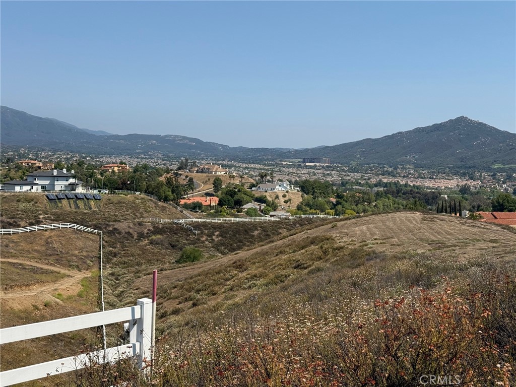 10+-acres on Paulita Road with Panoramic views of the Temecula Valley. Multiple building sites all with excellent views. Bring your horses, plant crops. The city of Temecula general plan shows the property can be divided into 2.5 acre parcels. There is a 2 inch water lateral dedicated to the ten acres at the gate, along with all utilities. No liens or encumbrances, no special study zones and no fault zones. All survey makers are located and marked. Build a custom home, establish a vineyard, or horse & livestock. Close to Old Town Temecula & popular wineries. Easy access to the 15 freeway, shopping & restaurants. Opportunity Knocks! Offered for $1,199,000.
