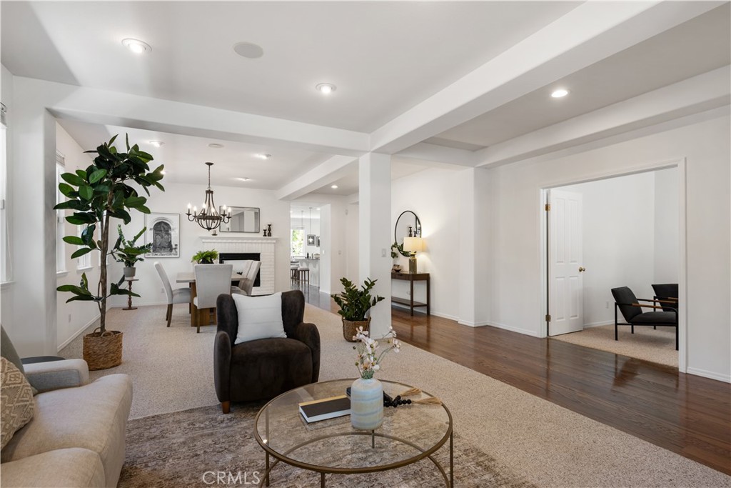 Situated on the 15th fairway of the sought-after Cypress Ridge Golf Course, this impeccably maintained single-level home offers 3 bedrooms plus a dedicated office. Designed with both comfort and style in mind, it features an open-concept layout filled with natural light, enhanced by neutral paint tones and updated lighting throughout. Upon entry, you're welcomed by rich wood flooring that flows through the home. A striking see-through gas fireplace creates a warm, inviting connection between the family room and dining area. The spacious kitchen is ideal for both entertaining and everyday living, complete with a large island, walk-in pantry, and abundant counter space—fit for any culinary enthusiast. The primary bedroom includes two walk-in closets, direct access to the backyard, and an en-suite bathroom with a frameless glass shower, double sinks and vanity area. Central air conditioning ensures year-round comfort, while a bonus area off the laundry room provides added shelving and storage—perfect for crafts, hobbies, or additional organization. Step outside to a fully fenced, professionally landscaped backyard featuring mature fruit trees and a raised garden bed. Whether you're dining al fresco, relaxing with a book, or tending to your garden, it’s the perfect space to enjoy the Central Coast’s exceptional weather year-round. Enjoy peace of mind in the gated community of Cypress Ridge, complete with a staffed guardhouse, beautifully maintained parks, and a low HOA fee of just $138/month.