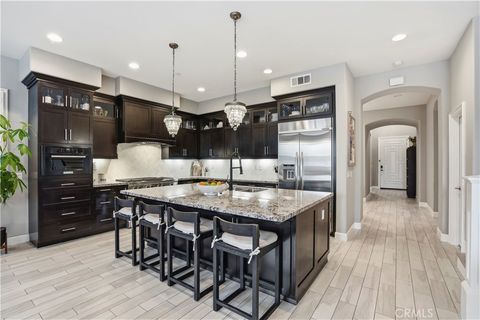 Photo of 17491 Oakbluffs Lane Ln, Huntington Beach, CA 92649 (MLS # OC26035151)